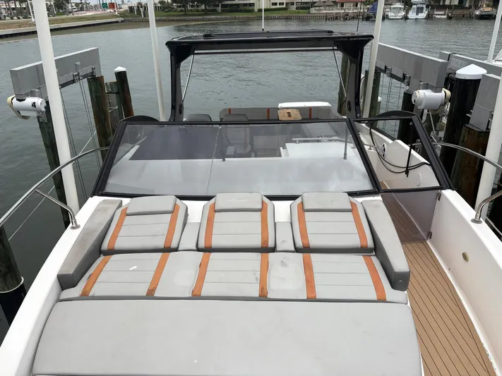 Yacht Photos Pics Luxury Hanover 377 boat, 2023 model, docked with spacious sunbathing area and sleek design.