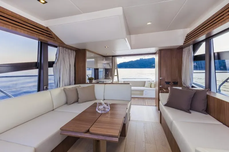 Marine Services S.a.s. Di Berruto Claudia Yacht Photos Pics Luxurious interior of 2015 Absolute 45 FLY yacht with elegant seating and scenic ocean view.