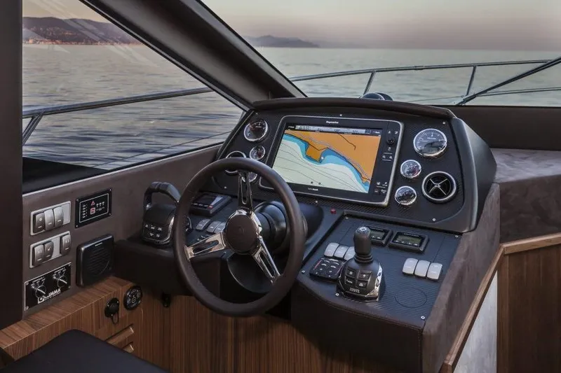 Marine Services S.a.s. Di Berruto Claudia Yacht Photos Pics Cockpit of 2015 Absolute 45 FLY yacht with navigation system and controls.