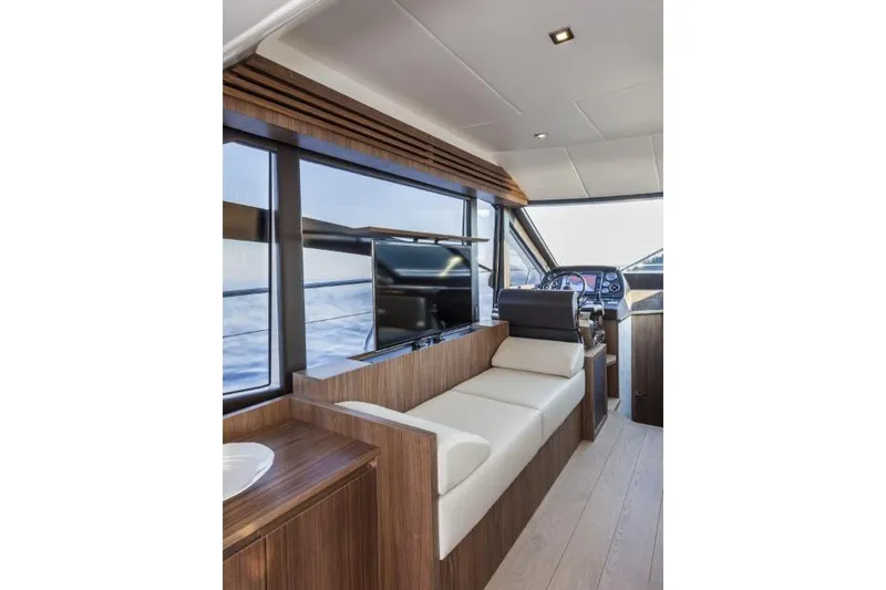 Marine Services S.a.s. Di Berruto Claudia Yacht Photos Pics Luxurious interior of 2015 Absolute 45 FLY yacht with modern seating and navigation area.