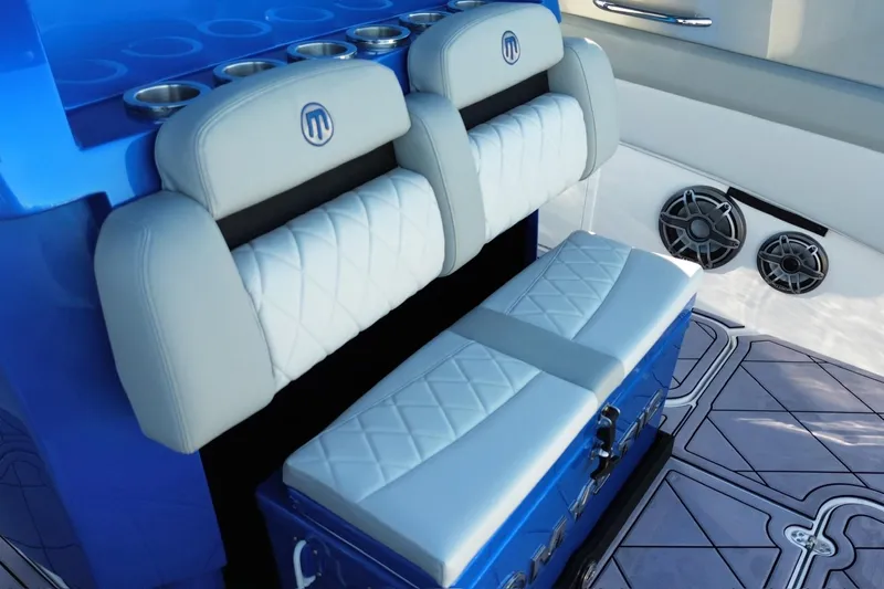 Take It To The Max Yacht Photos Pics 2023 Mystic Powerboats M3800 interior with luxurious seating and modern design.