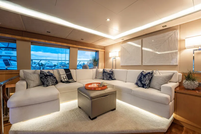 Tranquility Yacht Photos Pics Luxurious interior of 2013 Horizon PC60 yacht with elegant white seating and modern decor.