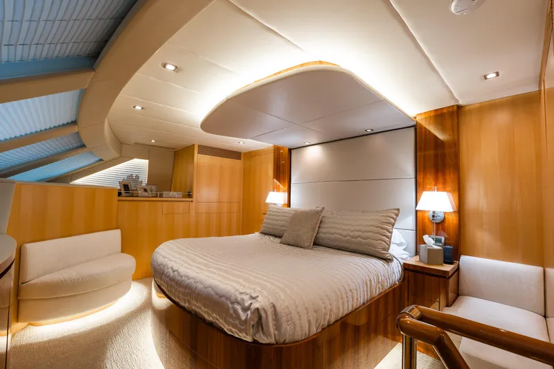 Tranquility Yacht Photos Pics Luxurious bedroom interior of 2013 Horizon PC60 yacht with elegant lighting and modern design.