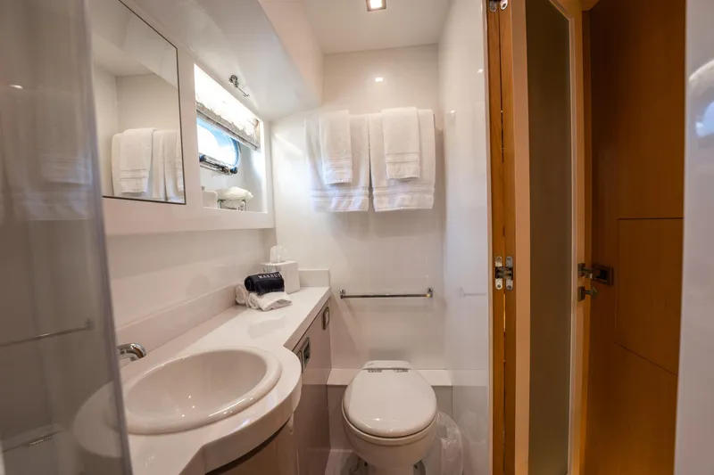 Tranquility Yacht Photos Pics Luxurious bathroom in 2013 Horizon PC60 yacht with modern fixtures and elegant design.