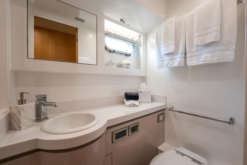 Tranquility Yacht Photos Pics Luxurious bathroom in 2013 Horizon PC60 yacht with modern fixtures and elegant design.