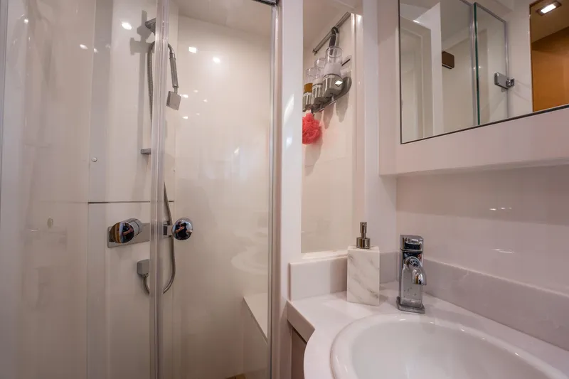 Tranquility Yacht Photos Pics Modern bathroom in 2013 Horizon PC60 yacht with shower and sink.