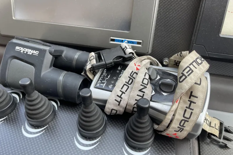  Yacht Photos Pics Binoculars and remote control on Pershing 62 yacht dashboard, 2013 model.