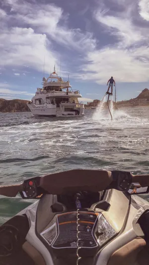 Marques Yacht Photos Pics Benetti Tradition 100 Yacht with flyboarder and jet ski, 2008 model.