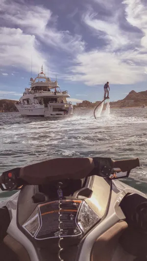 Marques Yacht Photos Pics Jet ski and flyboard in front of Benetti Tradition 100 yacht, 2008.