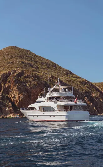 Marques Yacht Photos Pics Luxury yacht Benetti Tradition 100 from 2008 near rocky coastline.