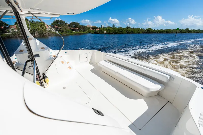  Yacht Photos Pics 2003 Sea Ray 560 Sedan Bridge yacht cruising on a sunny day.