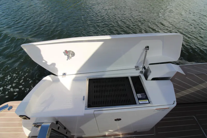  Yacht Photos Pics Open grill on Saxdor 400 GTS boat, 2025 model, by the water.