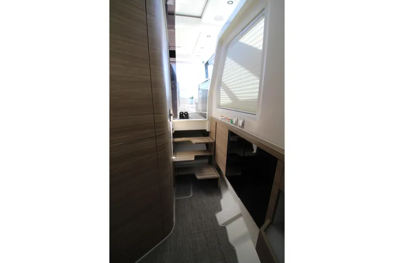  Yacht Photos Pics Interior of 2025 Saxdor 400 GTS yacht, featuring modern wood paneling and sleek design.