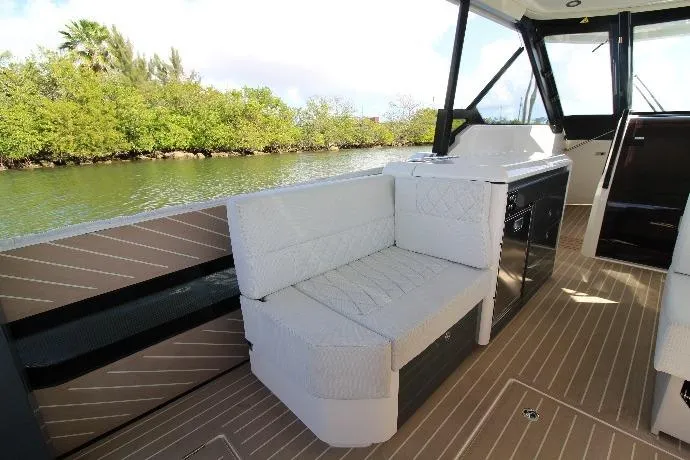  Yacht Photos Pics 2025 Saxdor 400 GTS boat interior with white seating and sleek design.