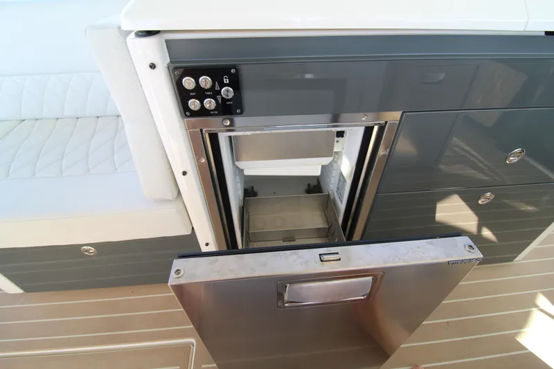  Yacht Photos Pics Open stainless steel drawer on Saxdor 400 GTS 2025 boat, showcasing interior storage.