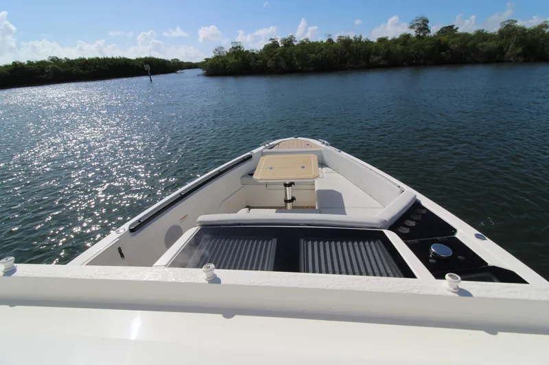  Yacht Photos Pics 2025 Saxdor 400 GTS boat on serene water with sunny sky.