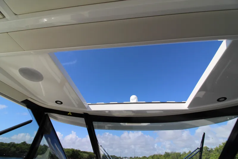  Yacht Photos Pics View through the sunroof of a 2025 Saxdor 400 GTS, showcasing a clear blue sky.