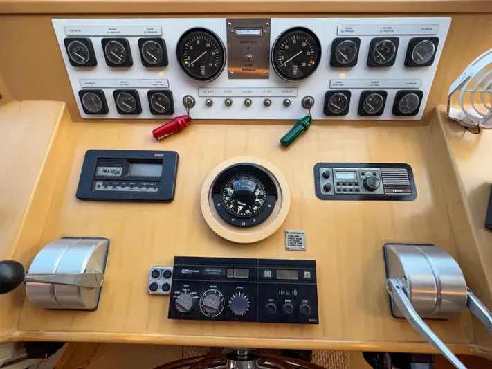 Audacious Yacht Photos Pics Control panel of a 1986 Southern Cross 53 yacht with gauges and navigation instruments.
