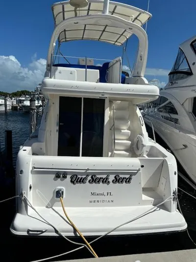  Yacht Photos Pics 2004 Meridian Sedan Bridge 341 docked in Miami, FL marina.