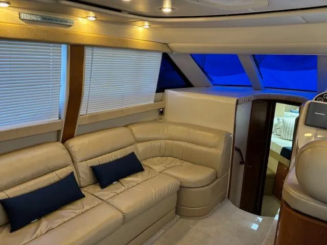  Yacht Photos Pics Luxurious interior of 2004 Meridian Sedan Bridge 341 yacht with beige leather seating.
