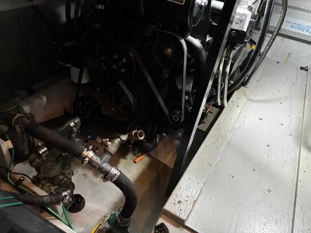  Yacht Photos Pics Engine compartment of 2004 Meridian Sedan Bridge 341 with visible components and hoses.