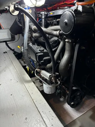  Yacht Photos Pics Engine compartment of 2004 Meridian Sedan Bridge 341, showcasing detailed mechanical components.