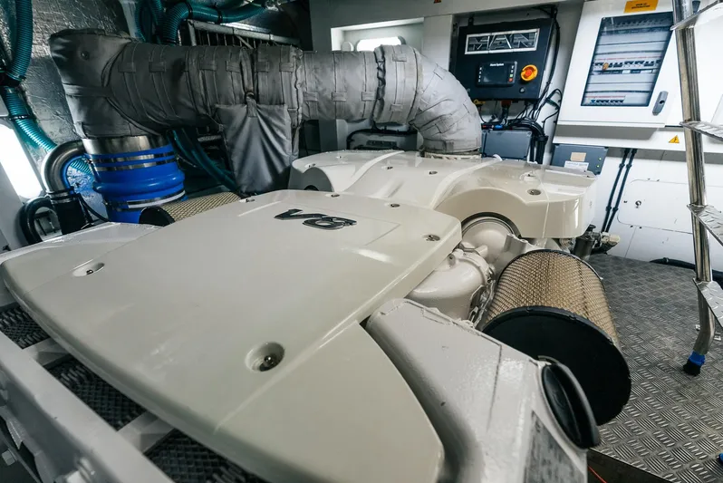 Gravitas Yacht Photos Pics Engine room of a 2018 Sunseeker Predator 68 yacht, showcasing advanced machinery.