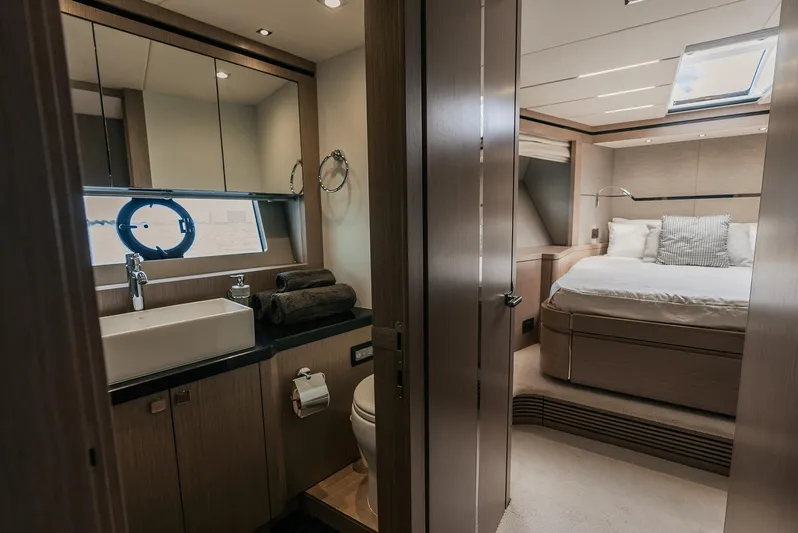 Gravitas Yacht Photos Pics Luxurious bathroom and bedroom interior of 2018 Sunseeker Predator 68 yacht.