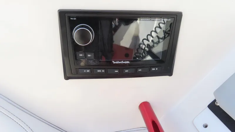  Yacht Photos Pics Rockford Fosgate stereo system on 2002 Fountain 47 Lightning boat dashboard.