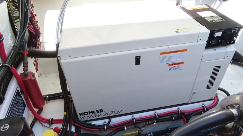  Yacht Photos Pics Kohler power system in 2002 Fountain 47 Lightning boat engine compartment.