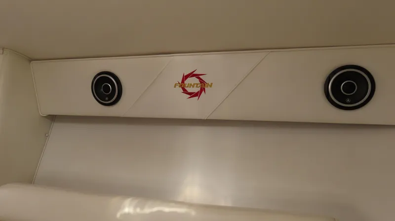  Yacht Photos Pics Interior of 2002 Fountain 47 Lightning boat with speakers and logo.
