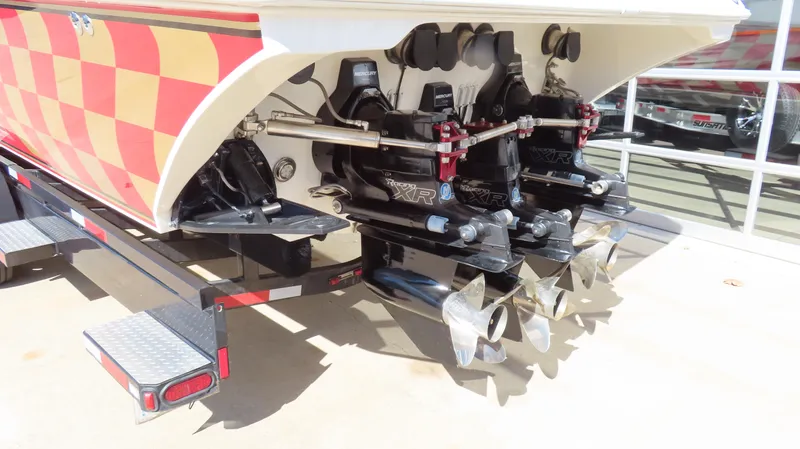  Yacht Photos Pics Rear view of a 2002 Fountain 47 Lightning boat with dual propellers.