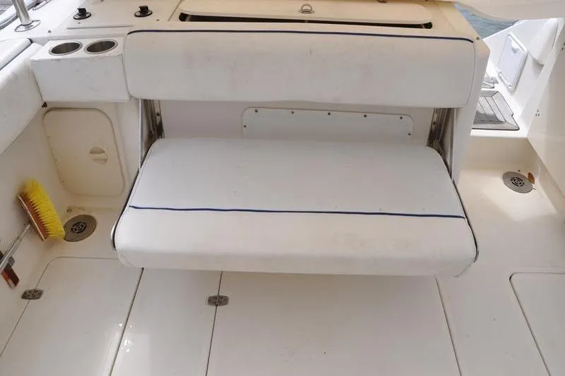  Yacht Photos Pics 2006 Pursuit 345 Drummond Sportfish boat interior with white seating and deck.