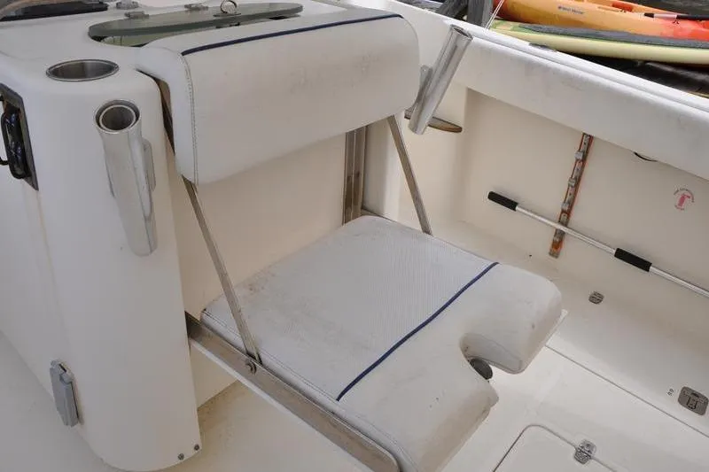  Yacht Photos Pics 2006 Pursuit 345 Drummond Sportfish boat seat with rod holders and storage.