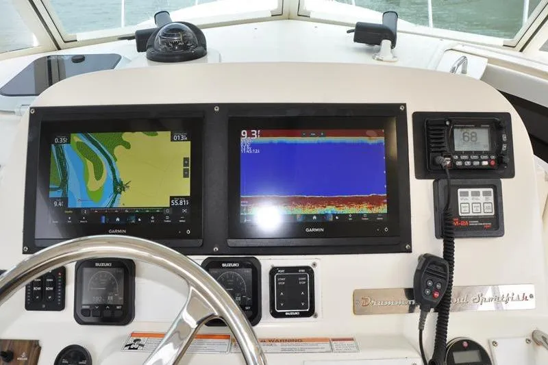 Yacht Photos Pics Dashboard of 2006 Pursuit 345 Drummond Sportfish with Garmin navigation displays.