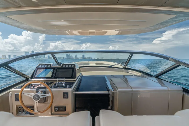Spin Yacht Photos Pics Helm of 2019 CNM Continental 54 yacht with city skyline view.