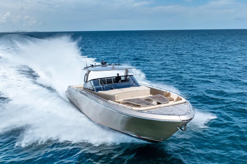 Spin Yacht Photos Pics 2019 CNM Continental 54 yacht cruising on open sea under clear skies.