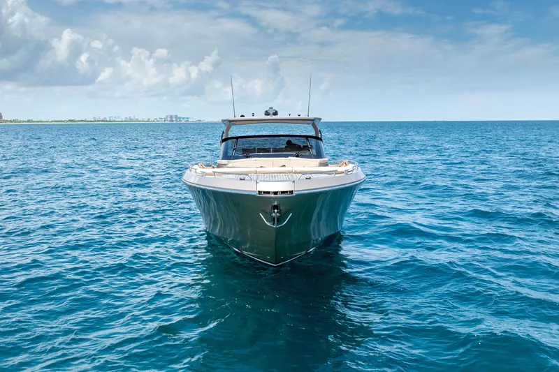 Spin Yacht Photos Pics 2019 CNM Continental 54 yacht on open sea under blue sky.