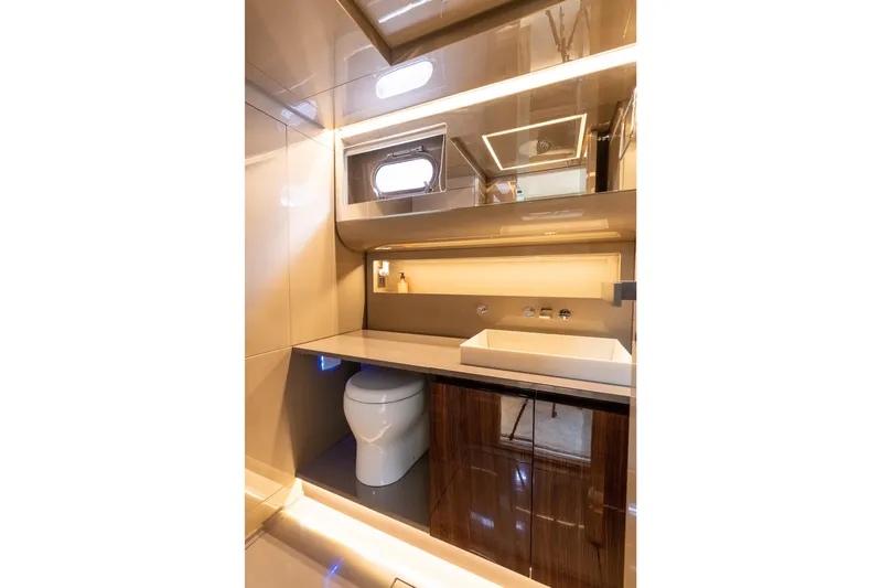 Spin Yacht Photos Pics Luxurious bathroom interior of 2019 CNM Continental 54 yacht with modern fixtures.
