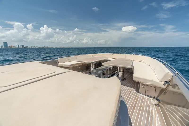 Spin Yacht Photos Pics Luxurious 2019 CNM Continental 54 yacht deck with ocean view and city skyline.