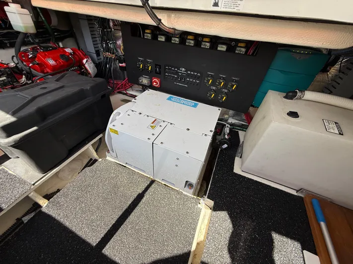  Yacht Photos Pics Electrical panel and equipment inside a 2022 Regal 36 XO boat engine room.