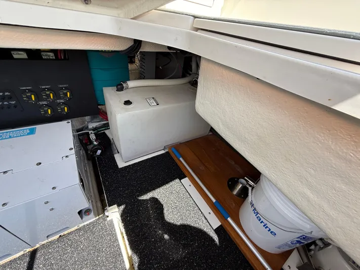  Yacht Photos Pics Engine compartment of 2022 Regal 36 XO boat with equipment and storage.