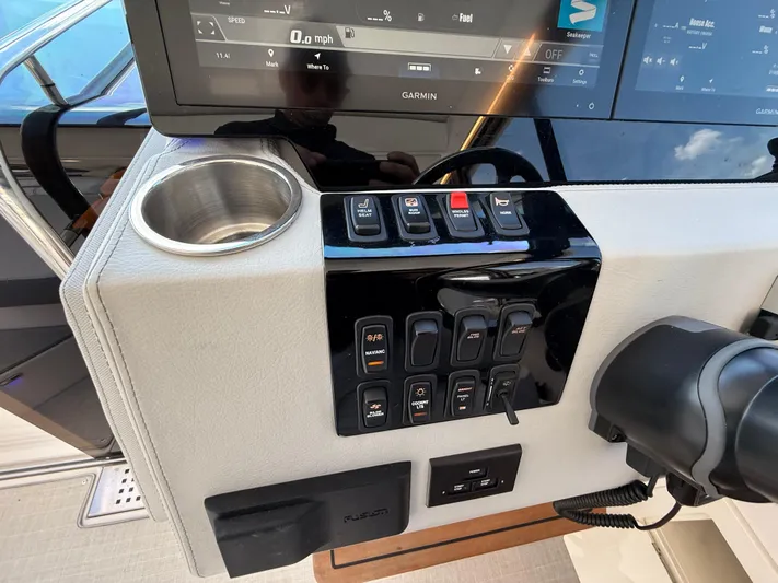  Yacht Photos Pics Control panel of 2022 Regal 36 XO boat with Garmin display and switches.