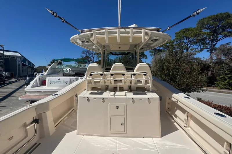 Your New Boat! Yacht Photos Pics 2024 Grady-White Canyon 336 boat interior with seating and fishing rod holders.