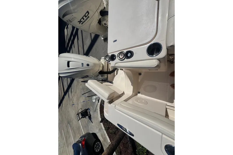 Your New Boat! Yacht Photos Pics 2024 Grady-White Canyon 336 boat with dual outboard engines, viewed from above.