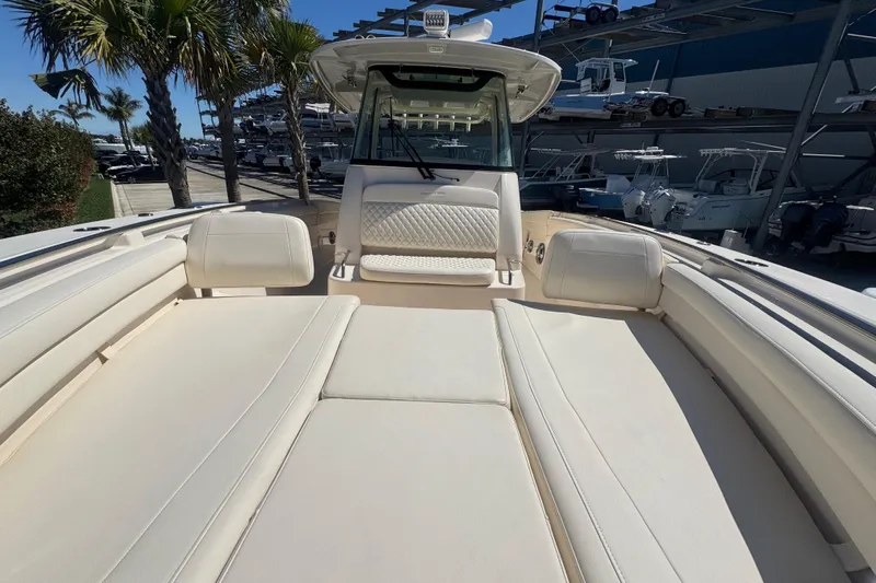 Your New Boat! Yacht Photos Pics 2024 Grady-White Canyon 336 boat interior with luxurious seating and modern design.