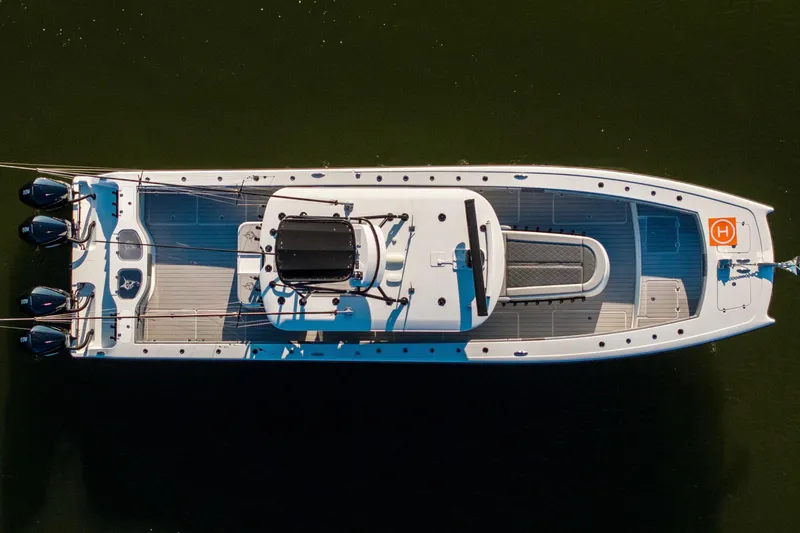  Yacht Photos Pics Aerial view of 2022 Freeman 42 LR boat with multiple outboard engines.