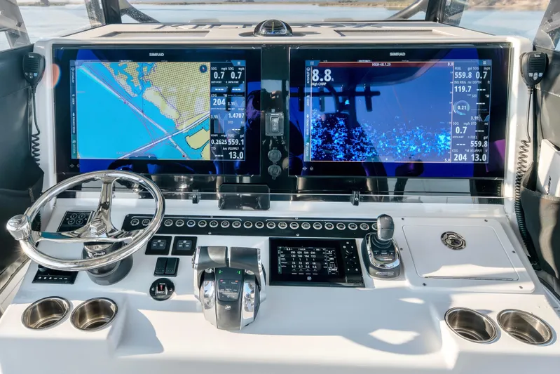  Yacht Photos Pics Freeman 42 LR 2022 boat dashboard with dual Simrad displays and navigation controls.