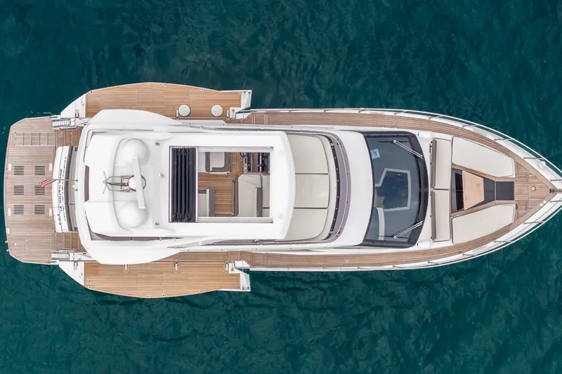 Infinity Yacht Photos Pics Aerial view of 2020 Galeon 500 Fly yacht on blue water.