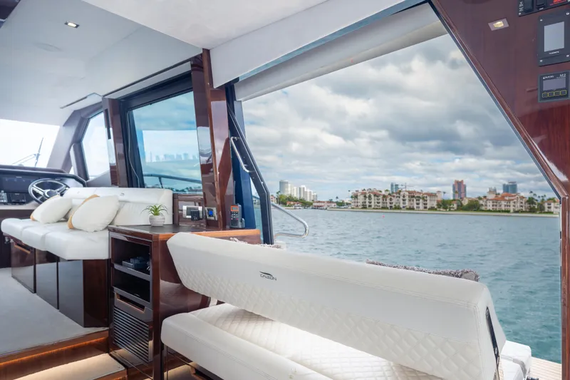 Infinity Yacht Photos Pics Luxurious interior of 2020 Galeon 500 Fly yacht with waterfront view.
